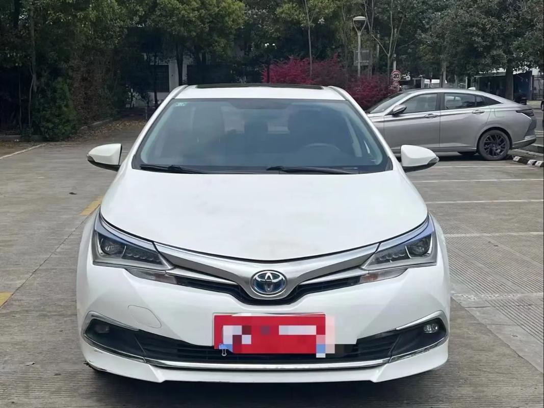 卡罗拉双擎一公里4毛怎么样